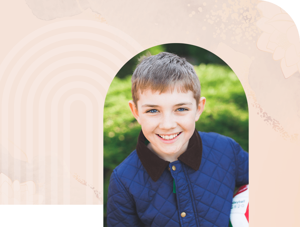 young boy smiling at camera