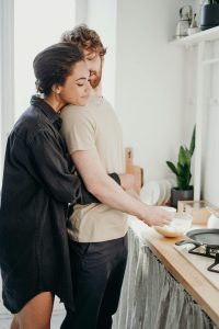 Couple sharing a heartfelt moment, expressing their love style.